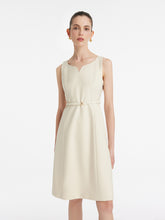 A lady wears a vest dress.